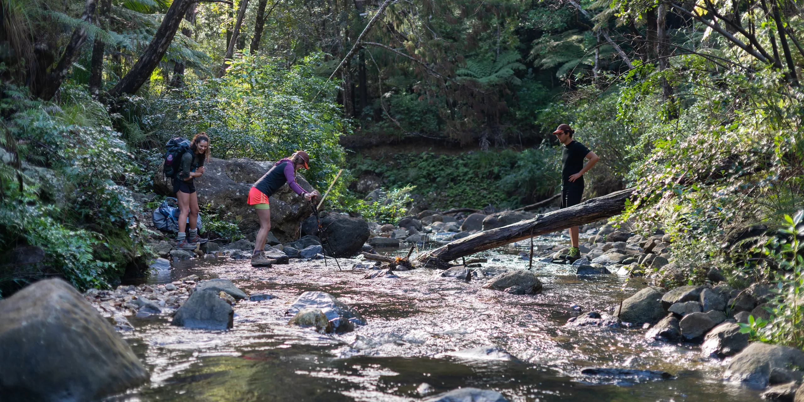 Carefully crossing the river. I got knee-deep to capture the moment.