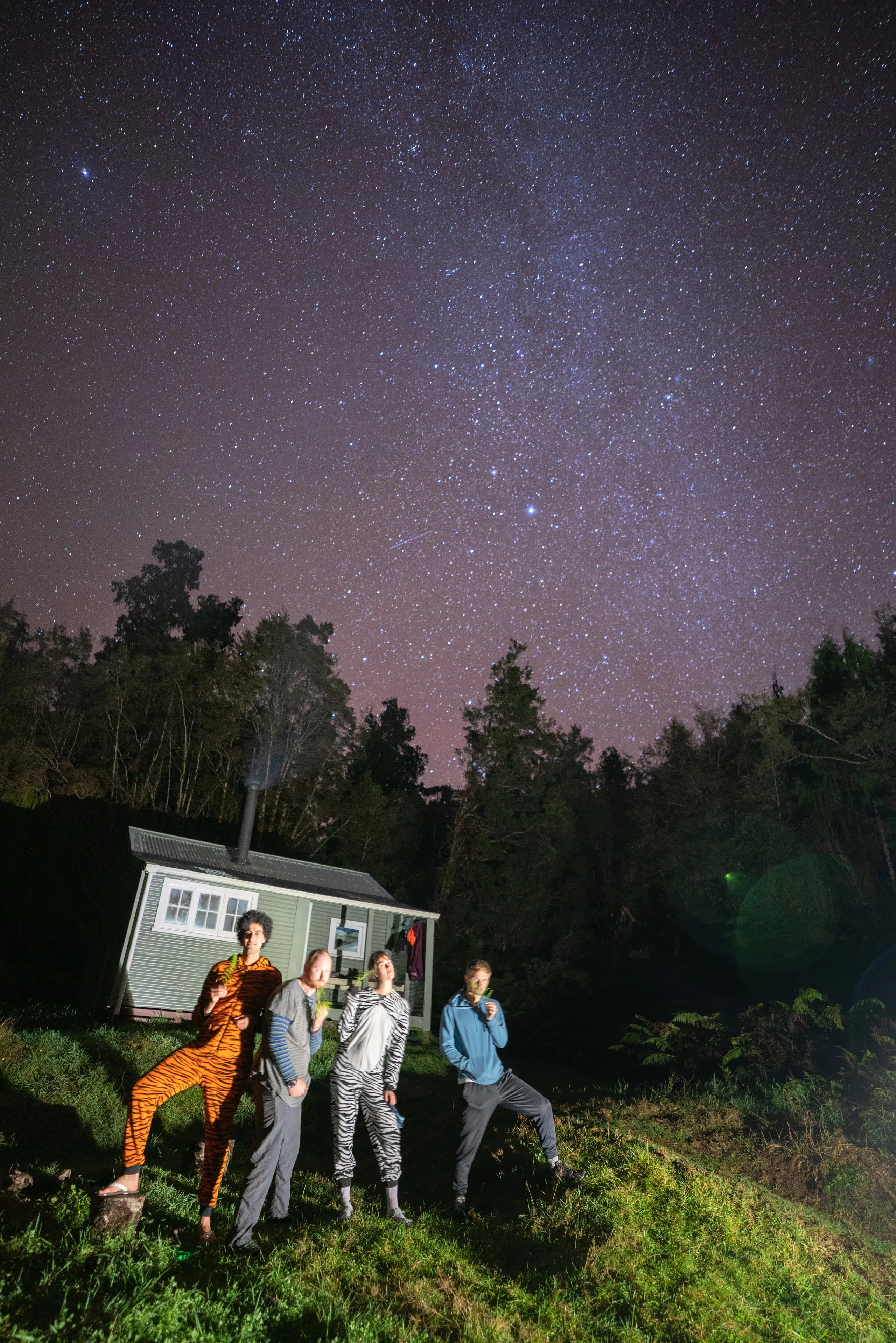 Posing for a photo outside Blue River (Blowfly) Hut on an unexpectedly clear evening